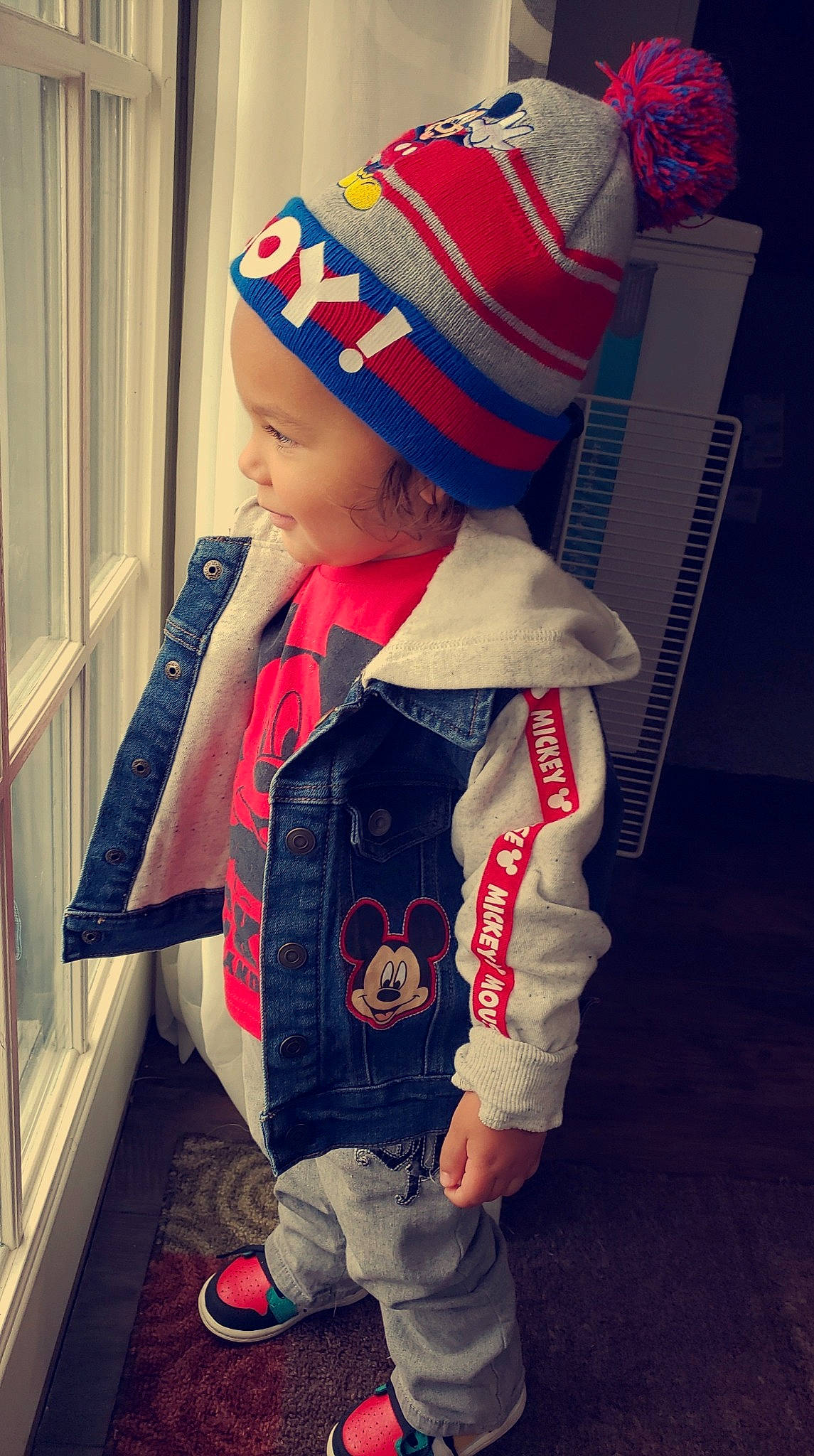 Keenan joined the competition — help win amazing prizes! baby, baby_products, baby_toddler_clothing, beanie, bonnet, carmine, christmas, cool, costume_accessory, costume_hat, curious, denim, fictional_character, jacket, knit_cap, overall, person, red, toddler, walking_shoe