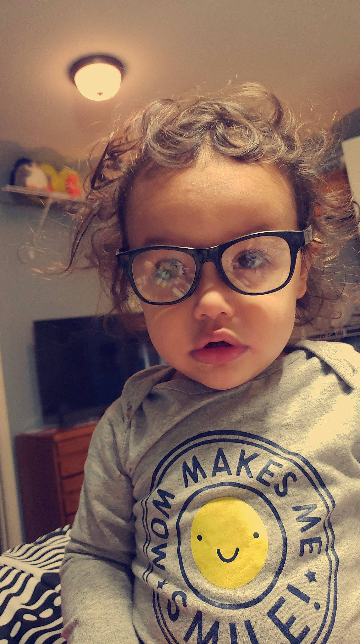 Keenan joined the competition — help win amazing prizes! active_shirt, baby, baby_toddler_clothing, cheek, child, clothing, cool, curious, emoticon, eyelash, eyewear, humour, light_fixture, lighting_accessory, person, smiley, t_shirt, toddler, vision_care