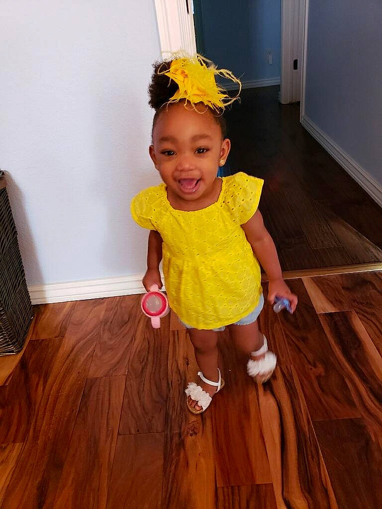 Alleigh joined the competition — help win amazing prizes! child, child_model, costume, fashion_accessory, floor, flooring, fun, hair_accessory, happy, hardwood, joy, laminate_flooring, party, party_supply, person, toddler, wood, wood_flooring, yellow