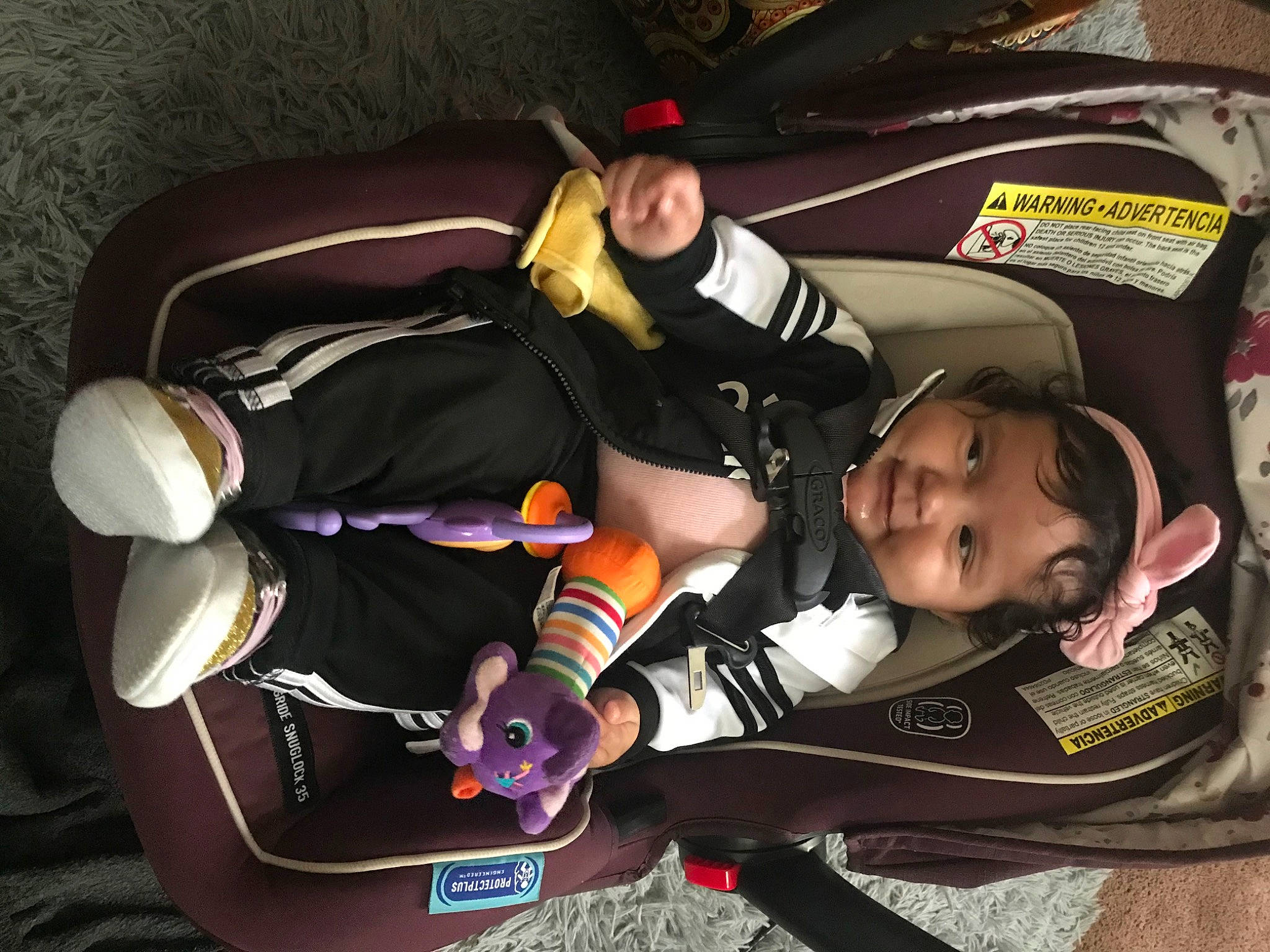 Milahni joined the competition — help win amazing prizes! baby, baby_carriage, baby_products, bag, boot, car_seat, carmine, child, comfort, costume, fictional_character, fun, lap, luggage_and_bags, person, personal_protective_equipment, recreation, room, sitting, toddler