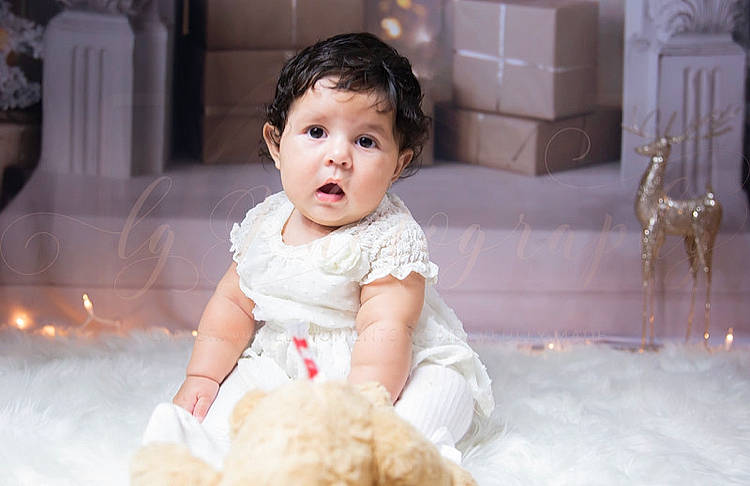 Milahni is registered to the contest to win money with this photo: baby, baby_toddler_clothing, beauty, cheek, child, dress, event, face, flash_photography, flooring, happy, head, human, mammal, people, person, skin, sleeve, snapshot, surprise