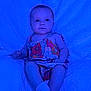 Riley joined the competition — help win amazing prizes! baby, child, infant, dress, floral, blanket, blue_light, sitting, cute, portrait, sock, cozy, soft, person, one_person, indoors, young, smiling, happy, skin