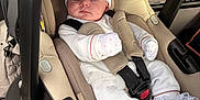 Arya is registered to the contest to win money with this photo: baby, bow, car_interior, car_seat, child, cute, footwear, headband, infant, lace, mittens, newborn, peaceful, portrait, safety, seatbelt, sleeping, small_hands, soft_lighting, white_clothing