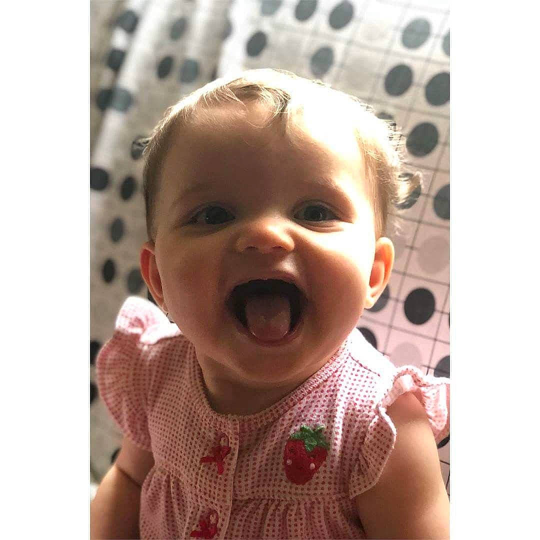Maddison is registered to the contest to win money with this photo: cheek, child, chin, ear, face, facial_expression, forehead, head, infant, lip, mouth, neck, nose, person, product, skin, smile, toddler, yawn