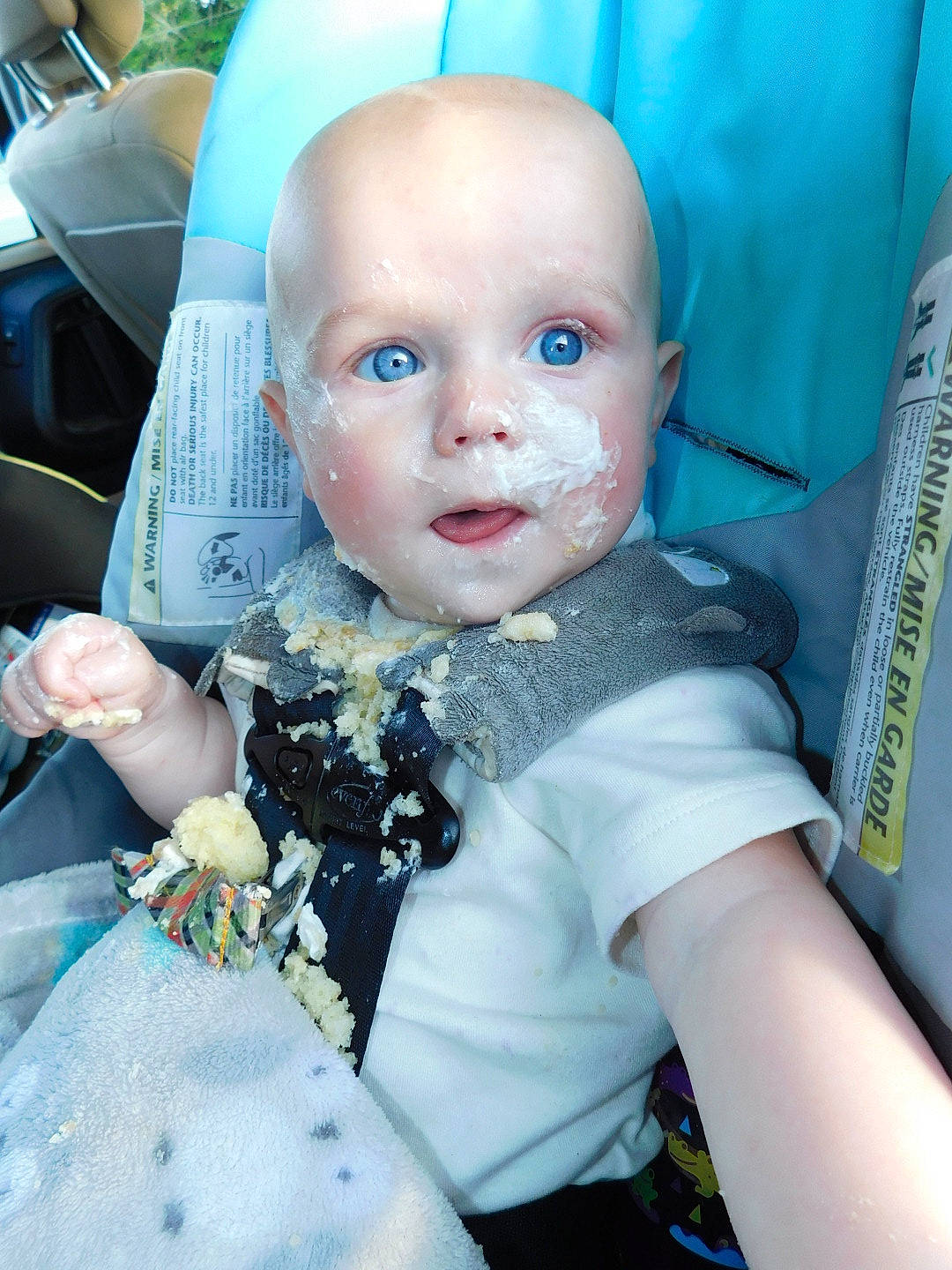 Silas is registered to the contest to win money with this photo: baby, car_seat, cheek, child, face, forehead, head, lip, person, skin, toddler