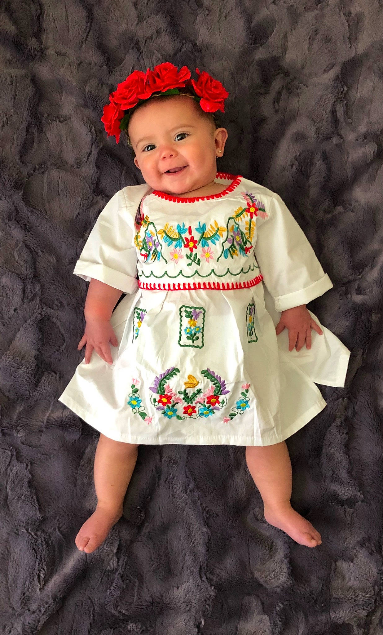 Reyna joined the competition — help win amazing prizes! baby_products, baby_toddler_clothing, child, child_model, clothing, dress, hair_accessory, joy, pattern, person, product, sleeve, textile, toddler