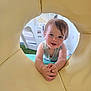 toddler, child, smiling, playground, indoor, play_structure, yellow, happy, clothing, hands, face, toy, crawling, cute, baby, head, person, fun, daylight, expression