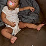 baby, sleeping, pacifier, blanket, couch, diaper, infant, child, relaxing, indoors, comfort, clothing, person, furniture, rest, cute, nap, peaceful, skin, home