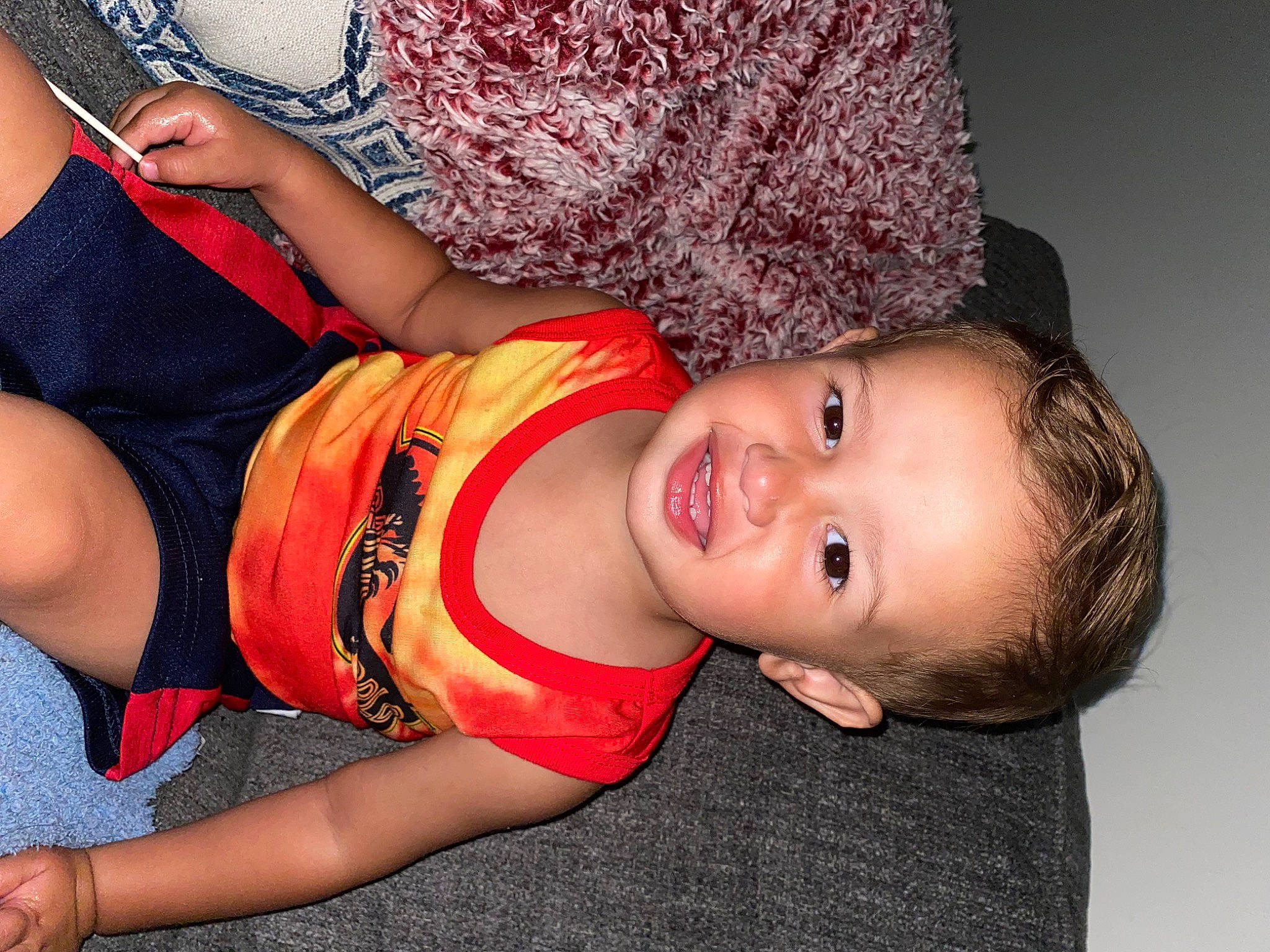 Mason is registered to the contest to win money with this photo: abdomen, black_hair, chest, child, elbow, flash_photography, fun, happy, human_leg, knee, mouth, navel, neck, person, shorts, smile, sportswear, thigh, toddler, trunk