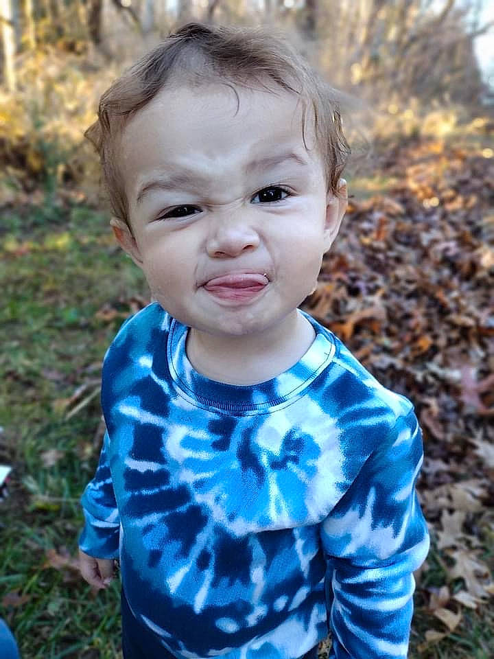 Mason joined the competition — help win amazing prizes! baby, baby_toddler_clothing, child, electric_blue, fun, grass, grass_family, happy, iris, pattern, people_in_nature, person, plant, sitting, soil, spring, sunlight, t_shirt, toddler, tree