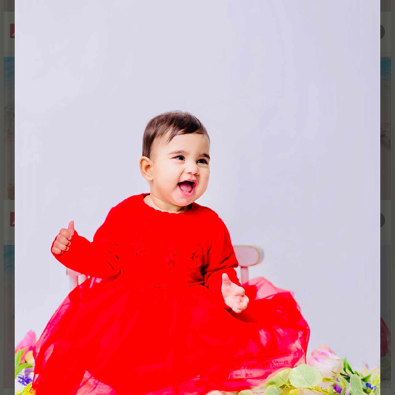 Arjoyi Kaur joined the competition — help win amazing prizes! baby, barefoot, bright, celebration, chair, child, colorful, cute, fashion, flowers, happy, indoor, innocence, joy, portrait, red_dress, sitting, smiling, studio, toddler