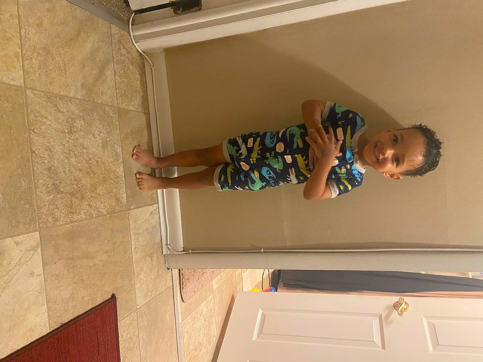 Darren is registered to the contest to win money with this photo: baby, baby_toddler_clothing, ceiling, child, comfort, elbow, floor, flooring, hardwood, joy, molding, person, plaster, rectangle, room, sleeve, t_shirt, thigh, toddler, wood