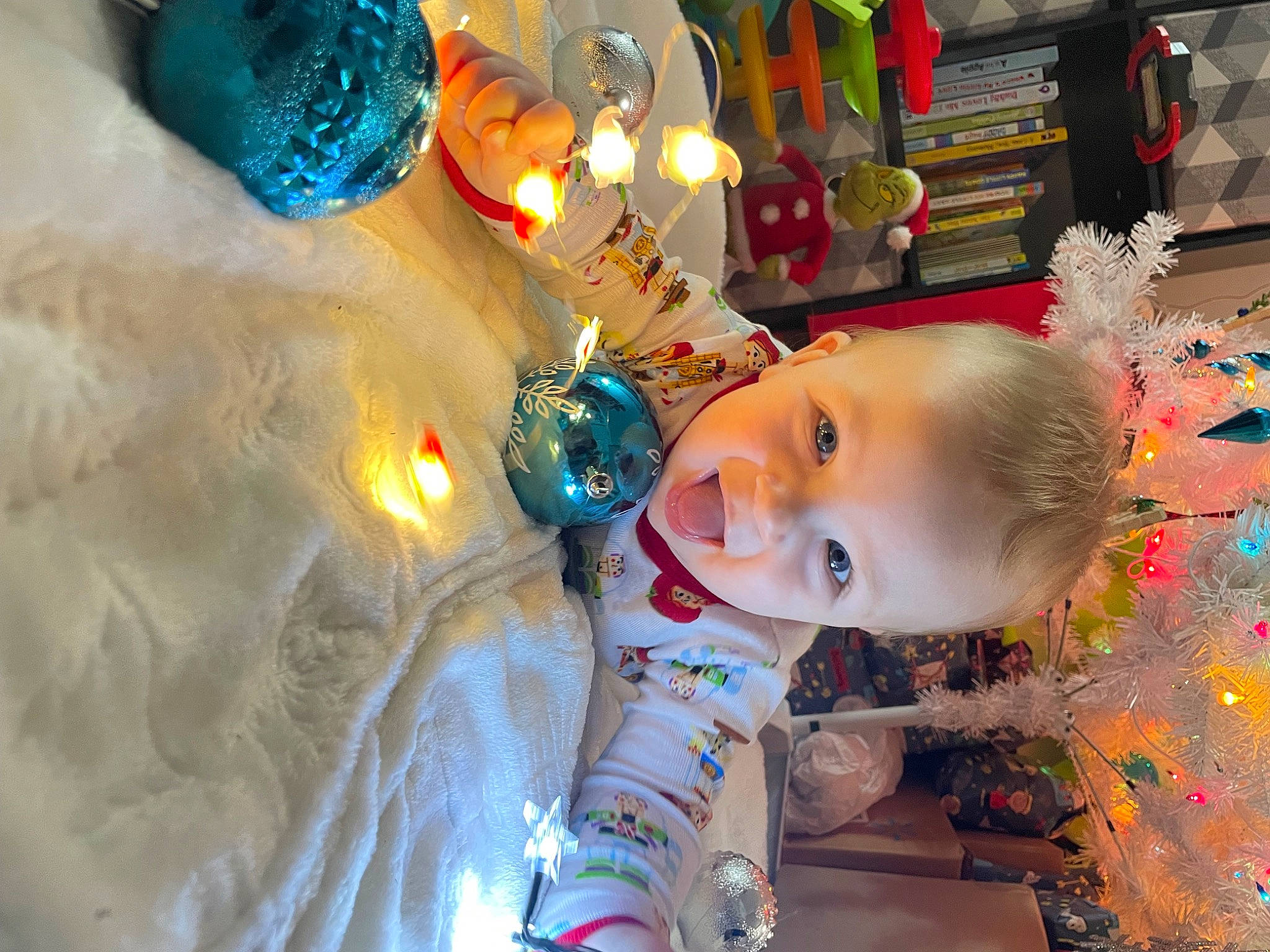 Kayson joined the competition — help win amazing prizes! baby, blue, cheek, child, christmas, christmas_decoration, christmas_eve, christmas_ornament, event, eye, fun, green, happy, holiday, leisure, person, play, space, toddler, tree