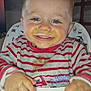 Wayne participe au concours pour gagner de l'argent avec cette photo : baby, child, high_chair, messy_face, food_stains, striped_shirt, smile, blue_eyes, teeth, happy, indoor, hands, face, clothing, person, close_up, young_child, hair, cheeks, dining