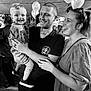 child, toddler, man, woman, smile, laugh, family, balloon, celebration, party, black_and_white, portrait, people, clothing, indoor, event, happy, casual, holding, together