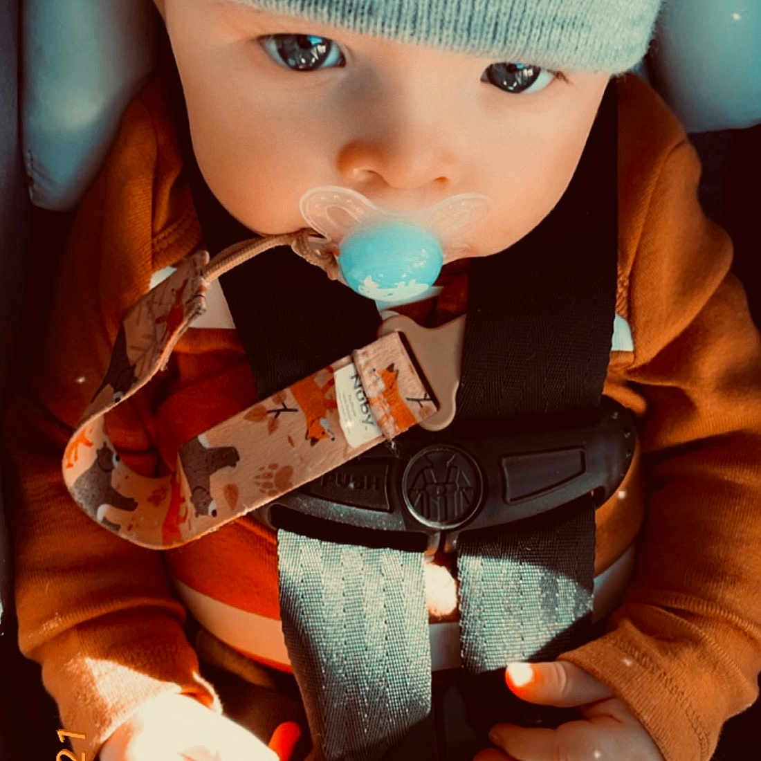 Sullivan is registered to the contest to win money with this photo: baby, baby_toddler_clothing, bow_tie, cap, cheek, child, cool, doll, eyelash, fashion_accessory, headgear, knit_cap, lip, outerwear, pattern, product, skin, sleeve, toy, wrist