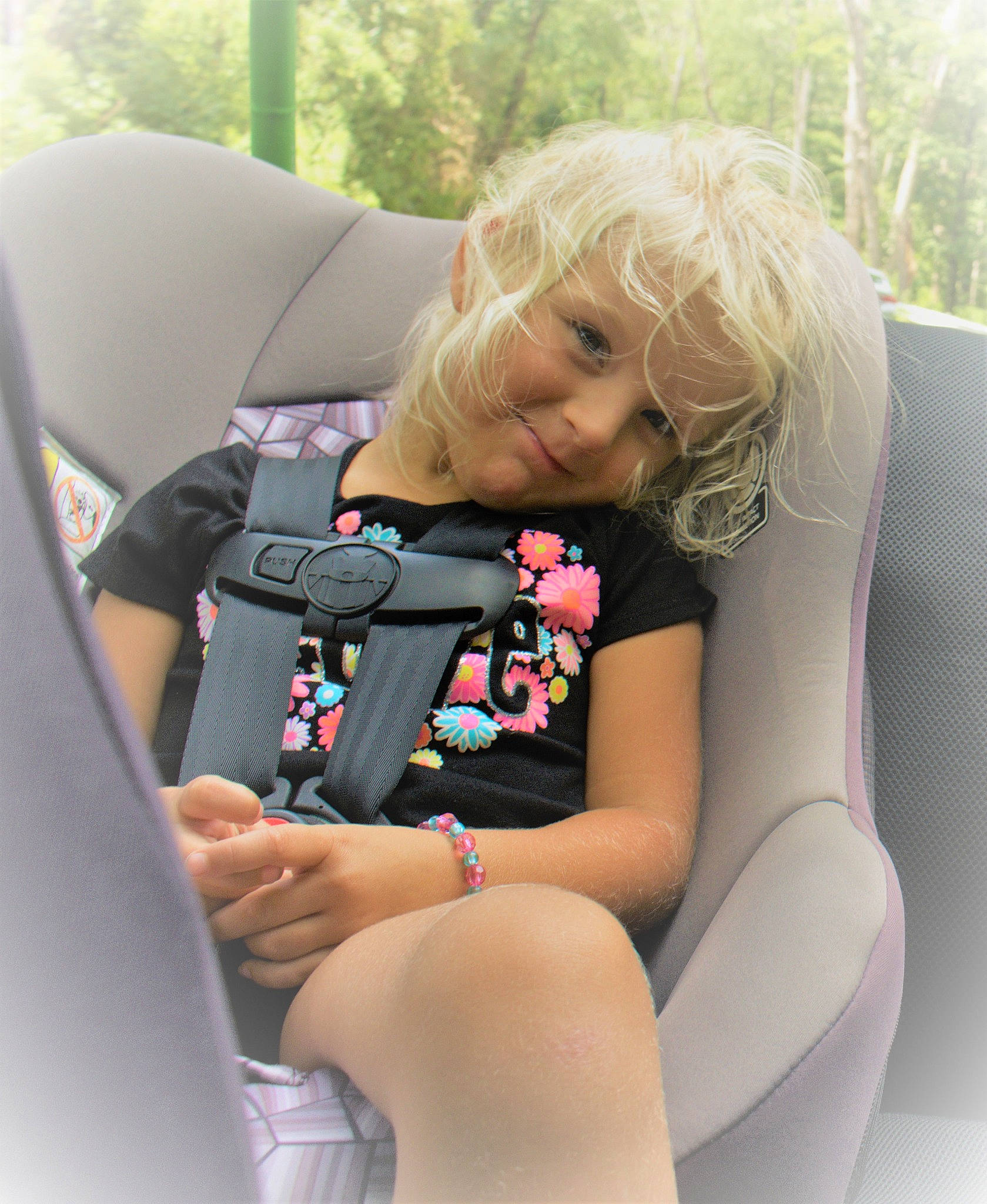 Alana joined the competition — help win amazing prizes! auto_part, automotive_design, car_seat, car_seat_cover, child, comfort, head_restraint, human_body, human_leg, leg, leisure, motor_vehicle, person, sitting, smile, steering_wheel, thigh, toddler, tree, vehicle_door