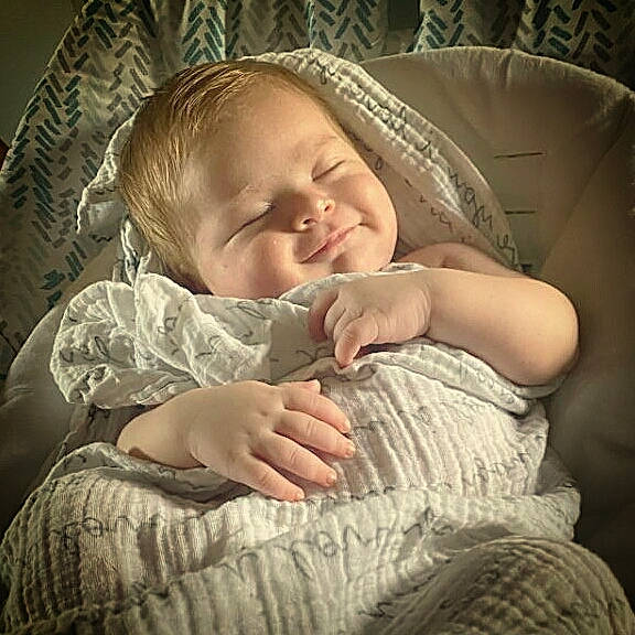 Michael joined the competition — help win amazing prizes! baby, baby_toddler_clothing, cheek, child, comfort, flash_photography, gesture, grass, happy, human_body, iris, lip, mammal, mouth, nose, person, skin, sleeve, smile, textile