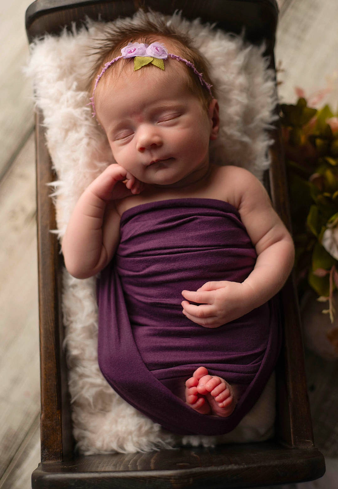 Wrenley is registered to the contest to win money with this photo: baby, baby_toddler_clothing, child, eye, face, flash_photography, hair, hairstyle, hand, happy, head, headband, headpiece, iris, person, pink, plant, shoulder, skin, textile