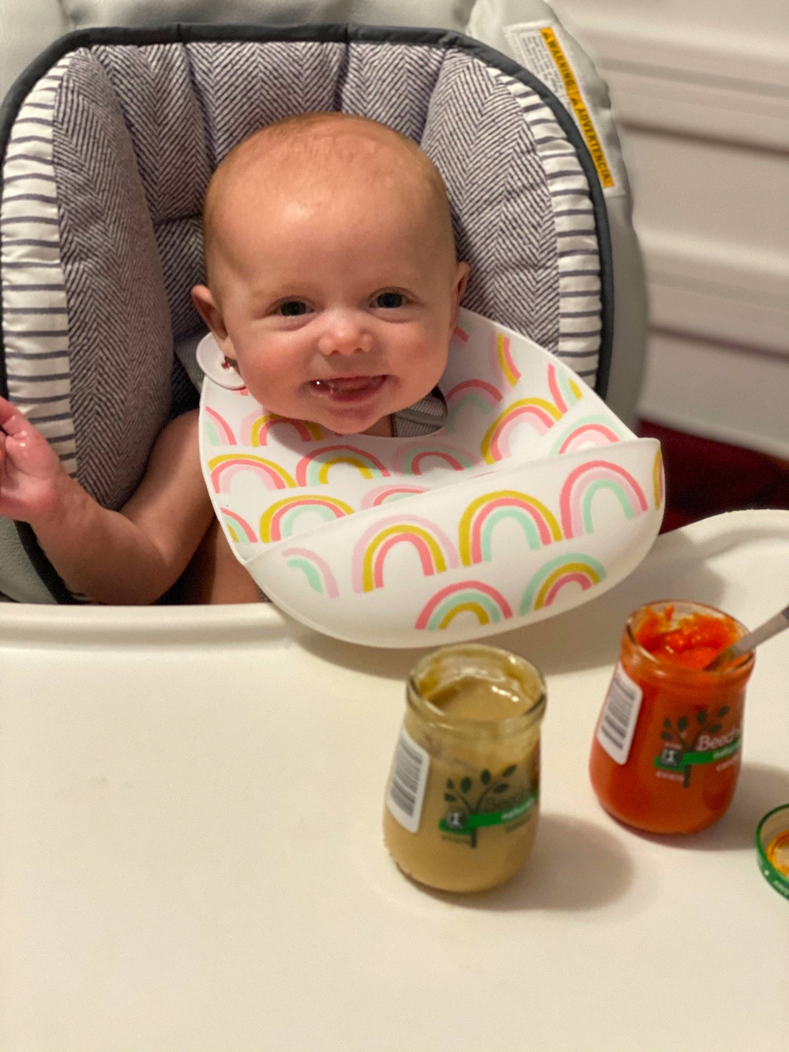 Mavis is registered to the contest to win money with this photo: baby, baby_carriage, baby_products, baby_safety, baby_toddler_clothing, baby_toys, chair, cheek, child, comfort, drinkware, food_storage_containers, fun, lid, person, plastic, product, room, sitting, smile