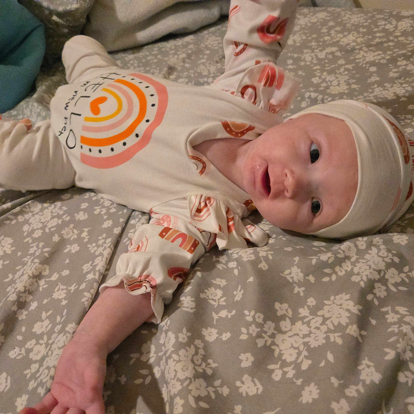 Cara joined the competition — help win amazing prizes! applique, baby, bed, bodypart, bonnet, cap, clothing, couch, face, finger, furniture, hand, hat, head, homedecor, newborn, pattern, person, photography, portrait