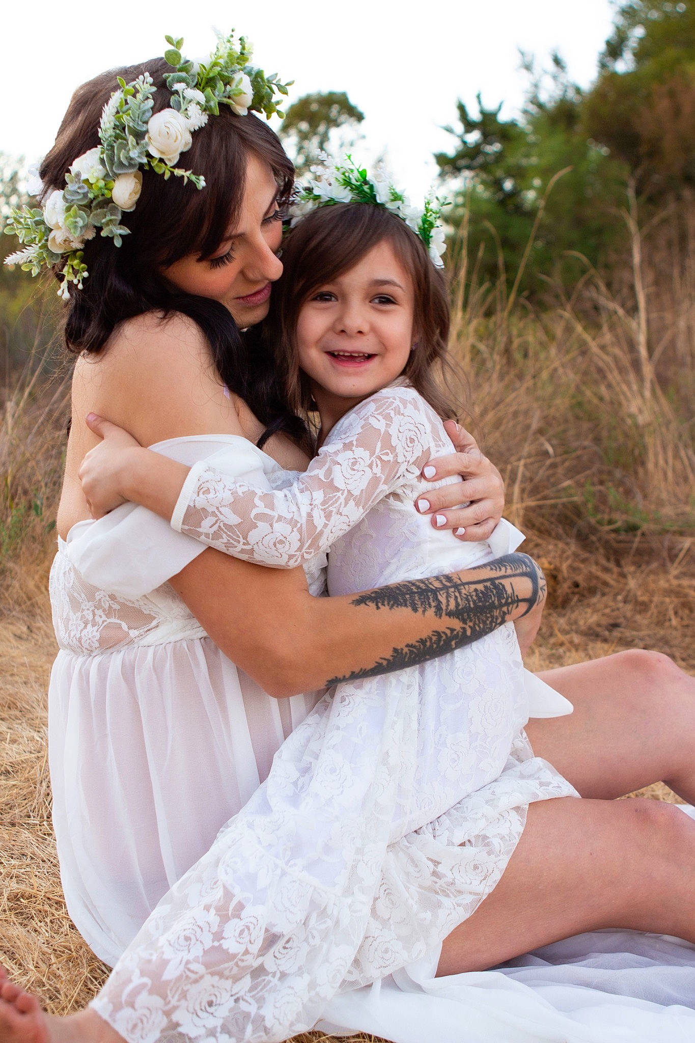 Bobbie is registered to the contest to win money with this photo: bridal_clothing, bridal_party_dress, bride, dress, finger, flash_photography, flower, gesture, gown, grass, hair, hairstyle, happy, joy, people_in_nature, person, plant, shoulder, skin, sky