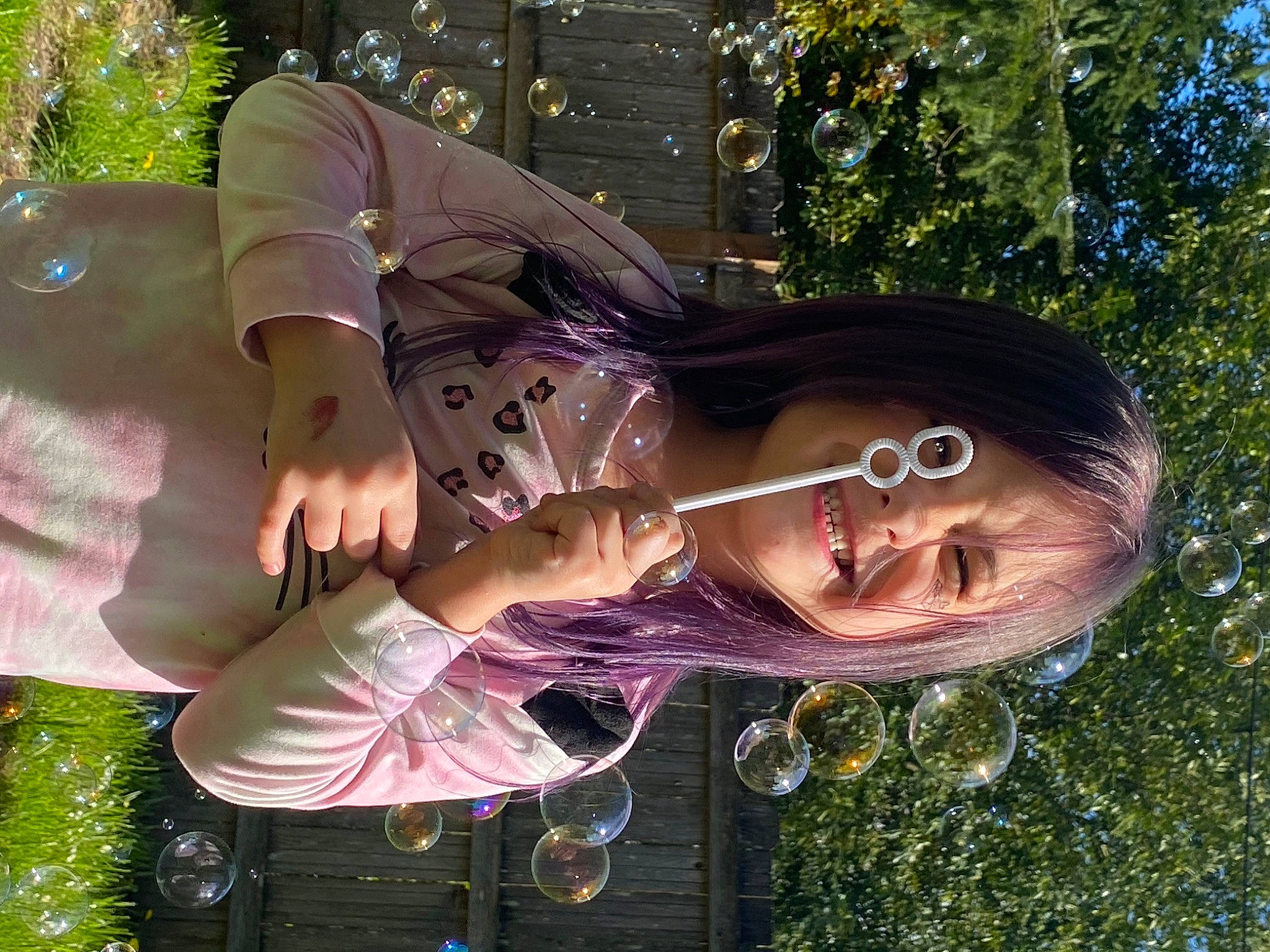 Bobbie joined the competition — help win amazing prizes! botany, child, eyewear, fun, gesture, grass, happy, joy, leisure, liquid_bubble, magenta, people_in_nature, person, pink, plant, smile, tree, water
