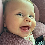 Brynlee is registered to the contest to win money with this photo: baby, car_seat, child, smiling, face, close_up, infant, seatbelt, graco, happy, cute, pink, clothing, safety, portrait, young, skin, human, head, expression