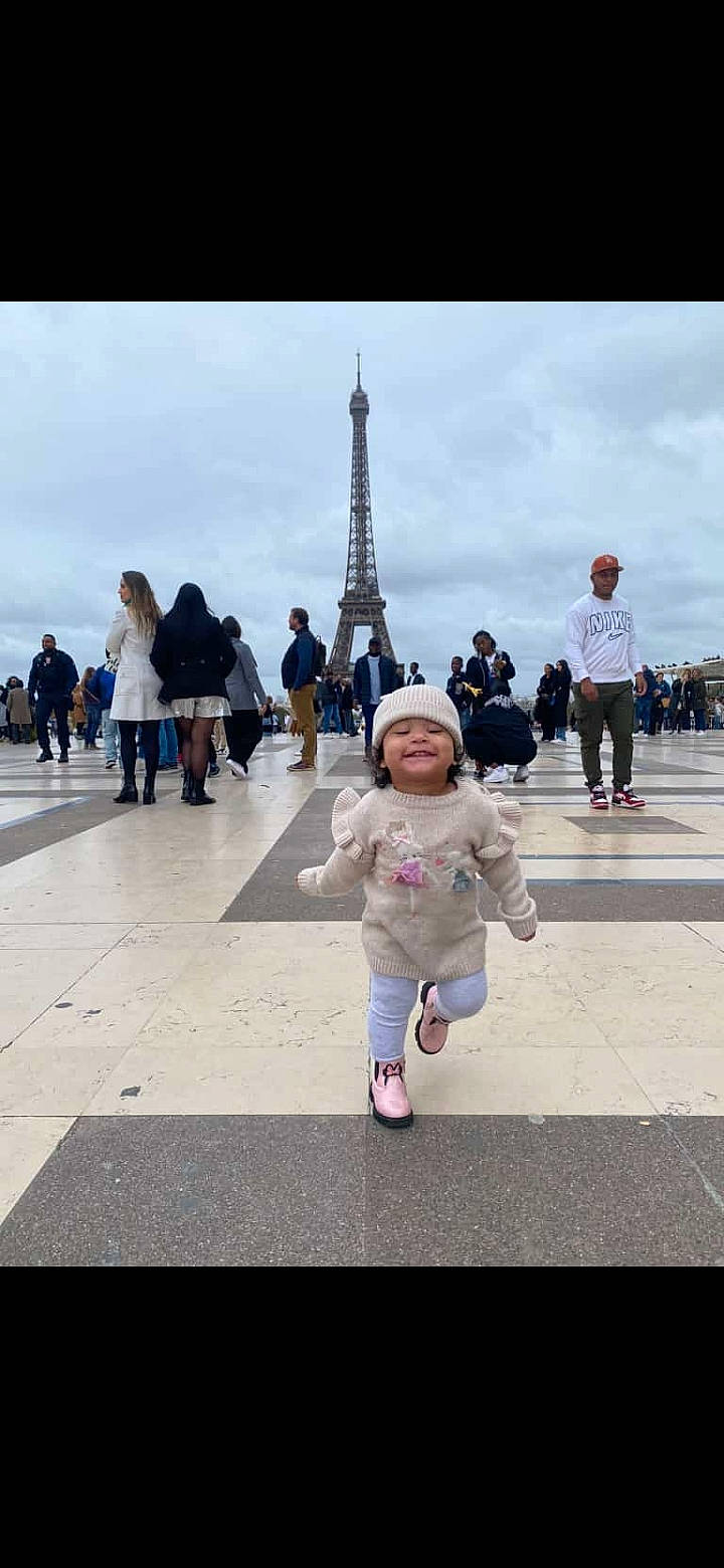 Kendall Sophia participe au concours pour gagner de l'argent avec cette photo : boot, child, city, cloud, fun, gesture, happy, headwear, joy, leisure, pedestrian, person, recreation, road, sky, street, toddler, tourism, tower, travel