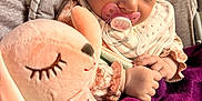 Miia joined the competition — help win amazing prizes! baby, sleeping, pacifier, plush_bunny, blanket, cozy, infant, cute, child, soft_toy, pink, purple, hand, peaceful, rest, closeup, indoor, comfort, toddler, clothing