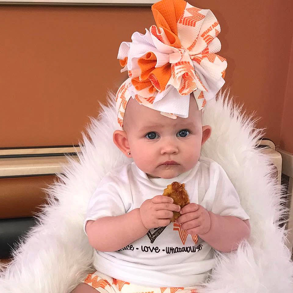 Chevy joined the competition — help win amazing prizes! baby, baby_toddler_clothing, child, costume, costume_hat, ear, event, fashion_accessory, fun, fur, hair_accessory, happy, hat, headband, headgear, headpiece, headwear, orange, peach, person
