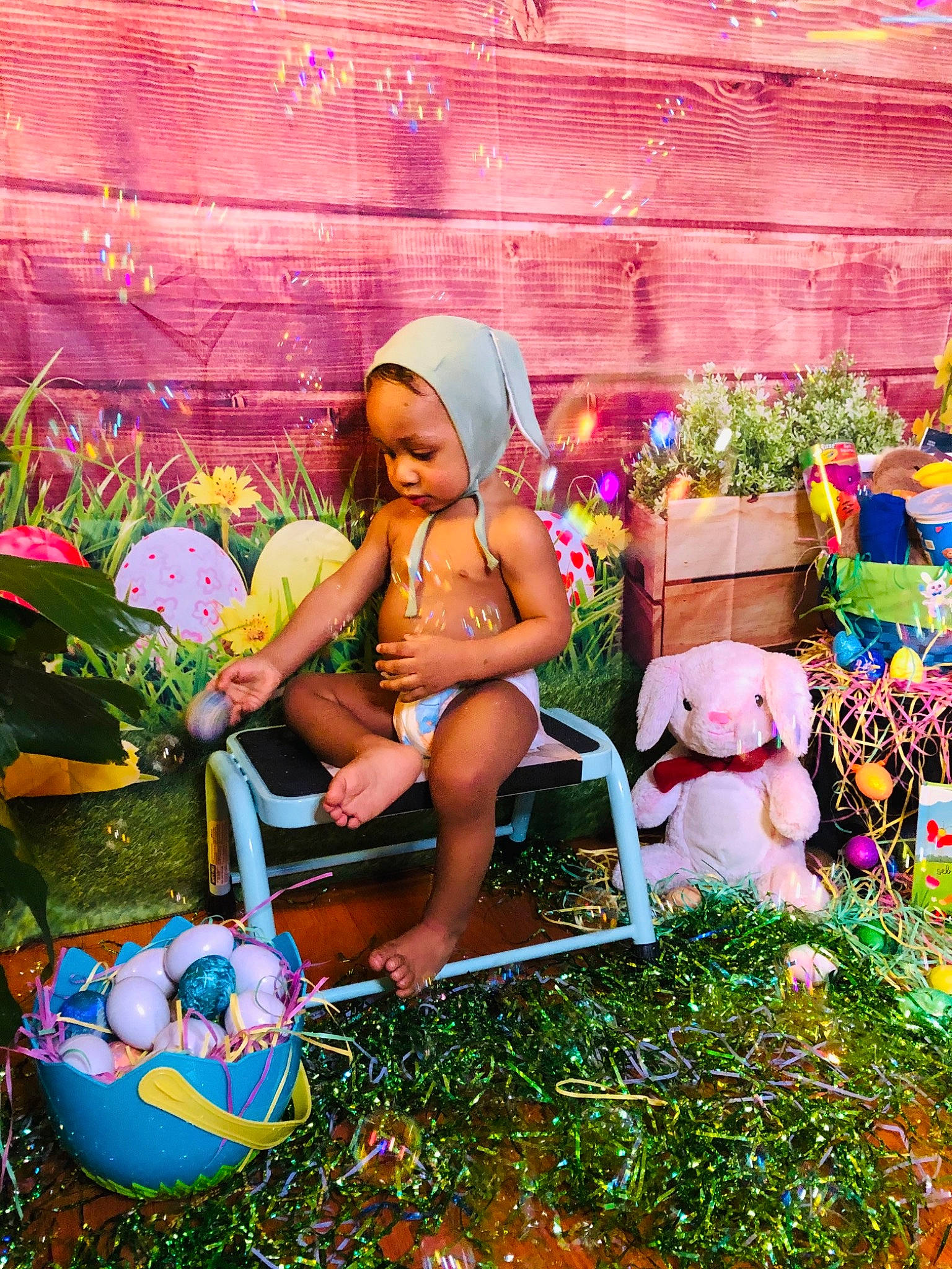 Kyree is registered to the contest to win money with this photo: ball, brassiere, christmas_decoration, christmas_ornament, event, fun, garden, grass, happy, holiday, human_leg, leisure, person, pink, plant, shorts, spring, swimwear, thigh, toddler