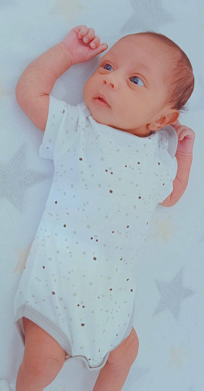 Nouzha participe au concours pour gagner de l'argent avec cette photo : arm, baby, baby_toddler_clothing, beauty, day_dress, finger, hand, lip, neck, one_piece_garment, pattern, person, pink, product, skin, sleeve, textile, thigh, toddler, waist