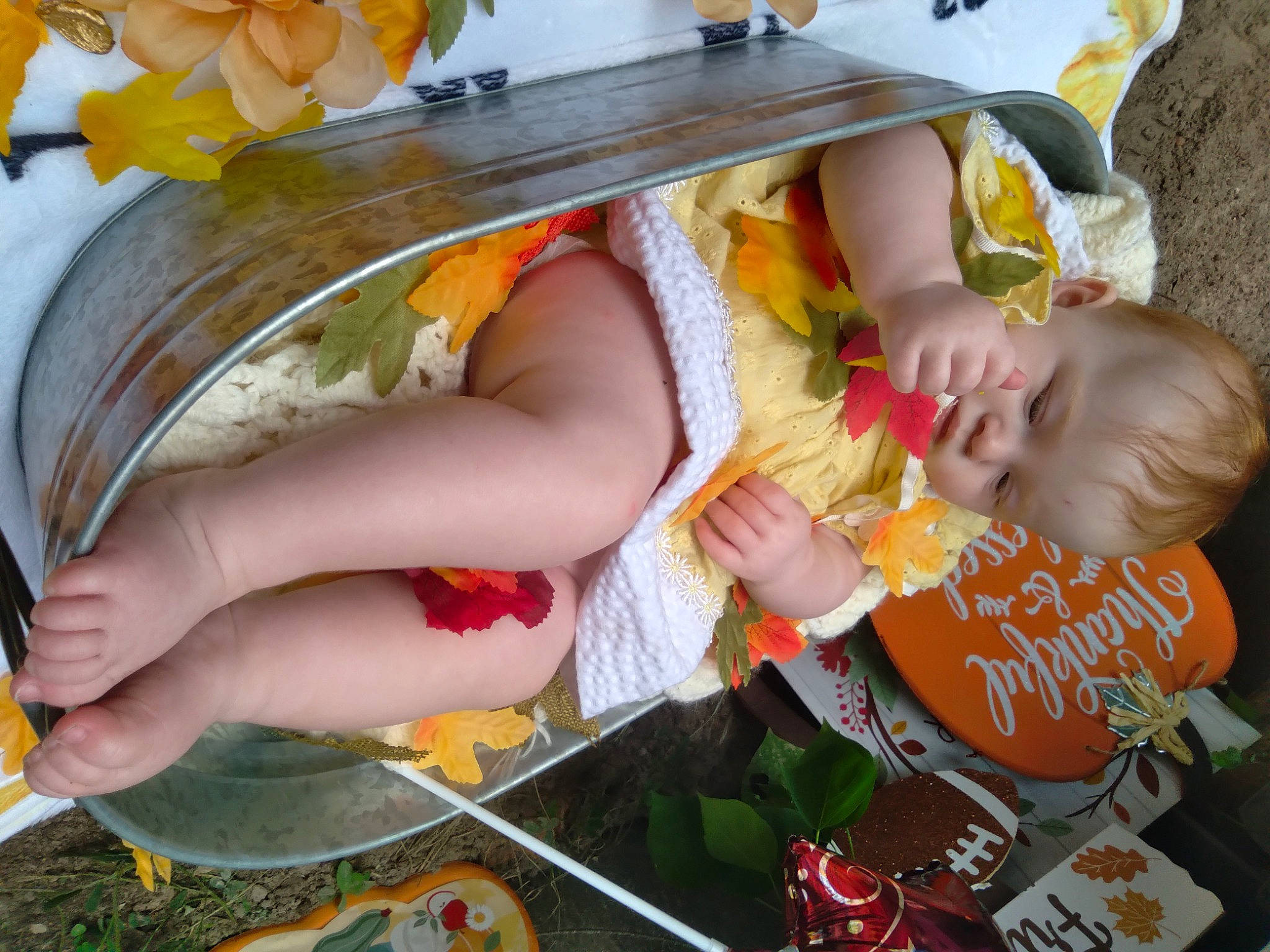 Makinsley joined the competition — help win amazing prizes! baby, calabaza, chair, child, event, finger, flower_arranging, fun, hand, happy, leisure, nail, orange, party, person, play, table, tableware, toddler, vacation
