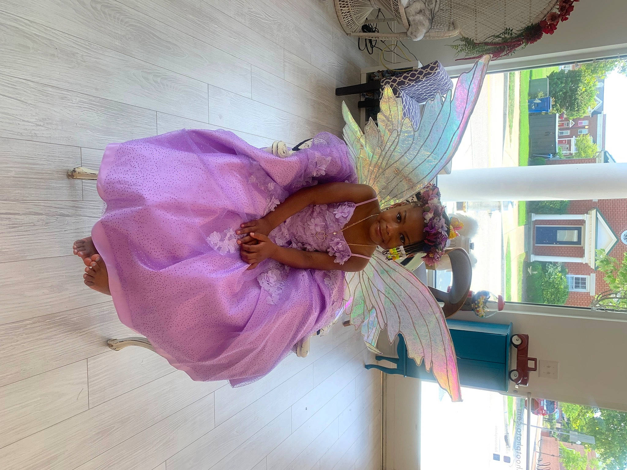 Amillian is registered to the contest to win money with this photo: ceiling, cut_flowers, door, event, floral_design, flower, flower_arranging, house, joy, magenta, person, petal, pink, plant, purple, room, tree, vase, violet, window