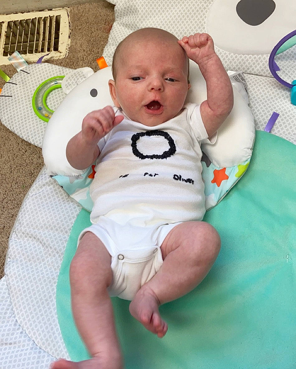 Oliver is registered to the contest to win money with this photo: baby, baby_products, baby_toddler_clothing, child, person, product, skin, smile, toddler