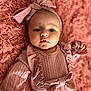 Sofia is registered to the contest to win money with this photo: baby, blanket, bow, child, closeup, clothing, cozy, cute, expression, face, headband, infant, lying_down, person, pink, portrait, ruffles, skin, soft_texture, warm_lighting