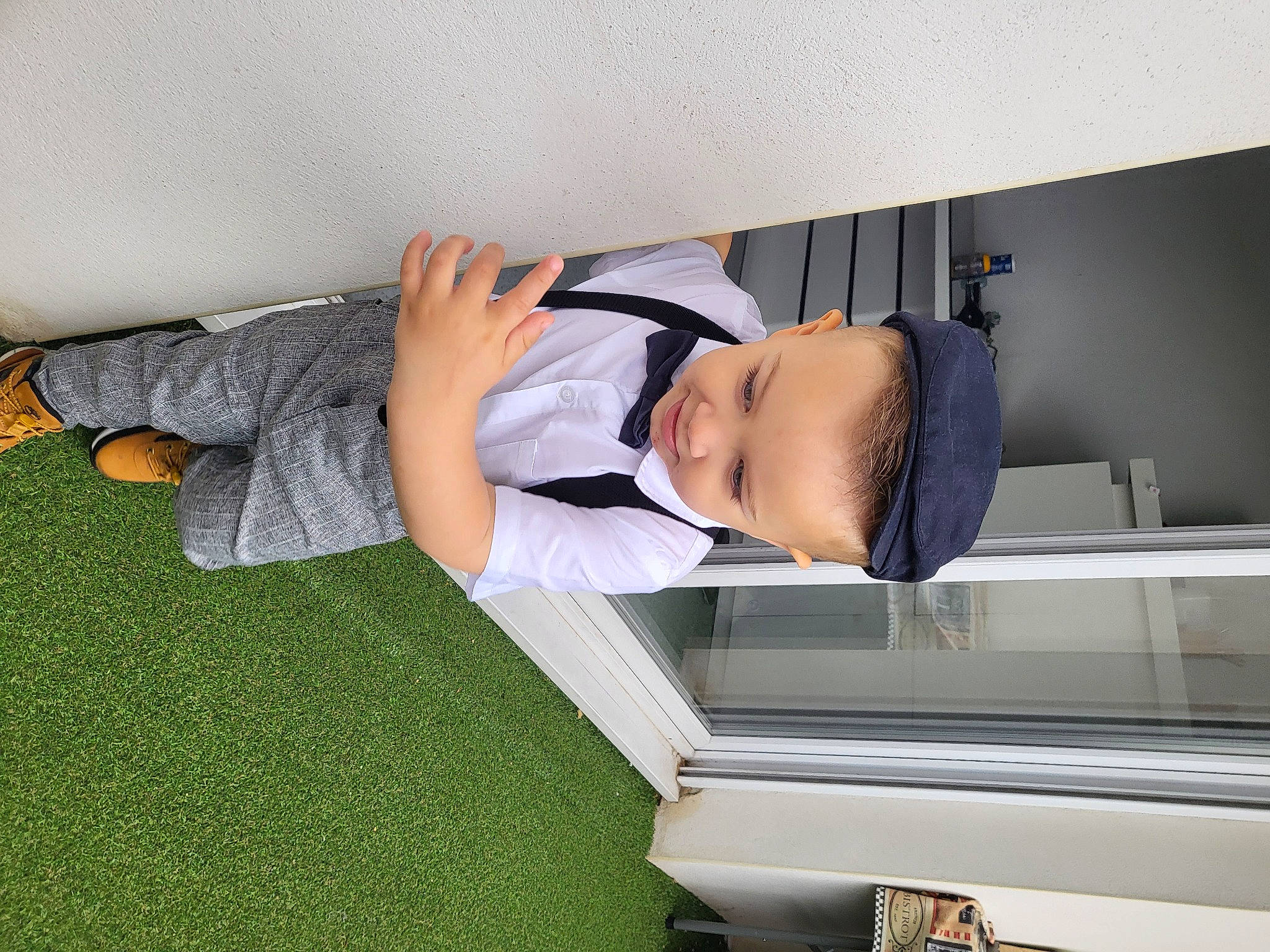 Lorenzo participe au concours pour gagner de l'argent avec cette photo : baby, baby_toddler_clothing, child, comfort, elbow, flooring, glasses, hat, human_leg, knee, machine, person, room, shorts, sitting, sock, sportswear, sunglasses, t_shirt, thigh