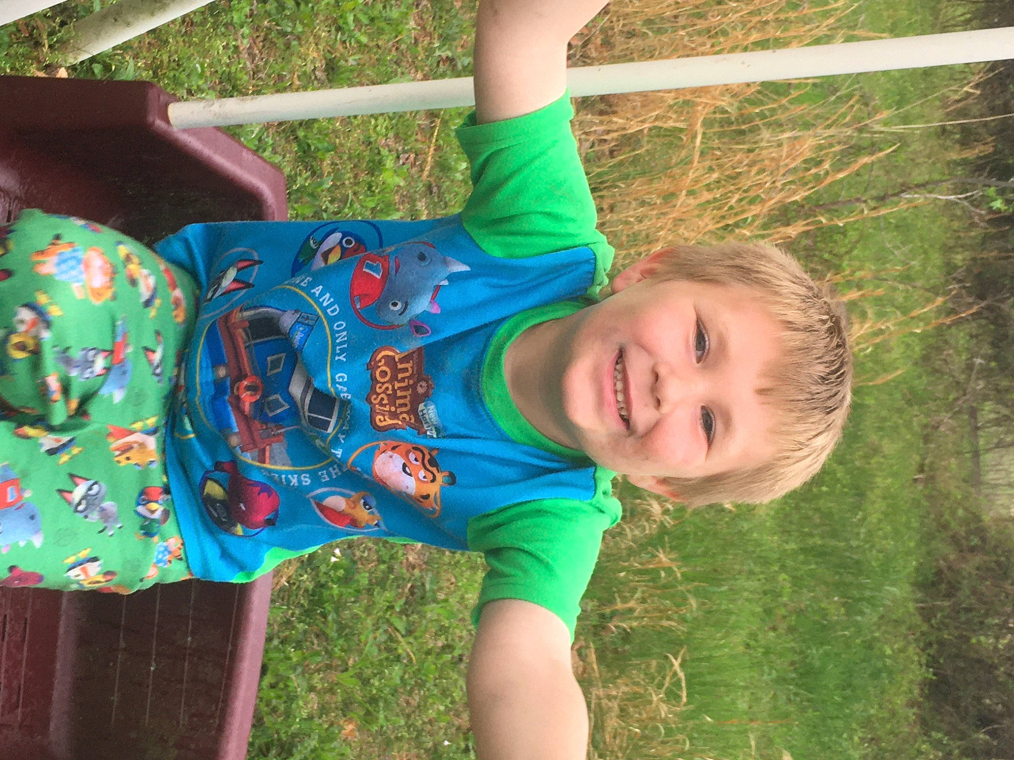 Walker is registered to the contest to win money with this photo: baby_toddler_clothing, child, city, electric_blue, fun, grass, grass_family, happy, human_body, joy, leisure, pattern, people_in_nature, person, plant, play, recreation, smile, spring, t_shirt