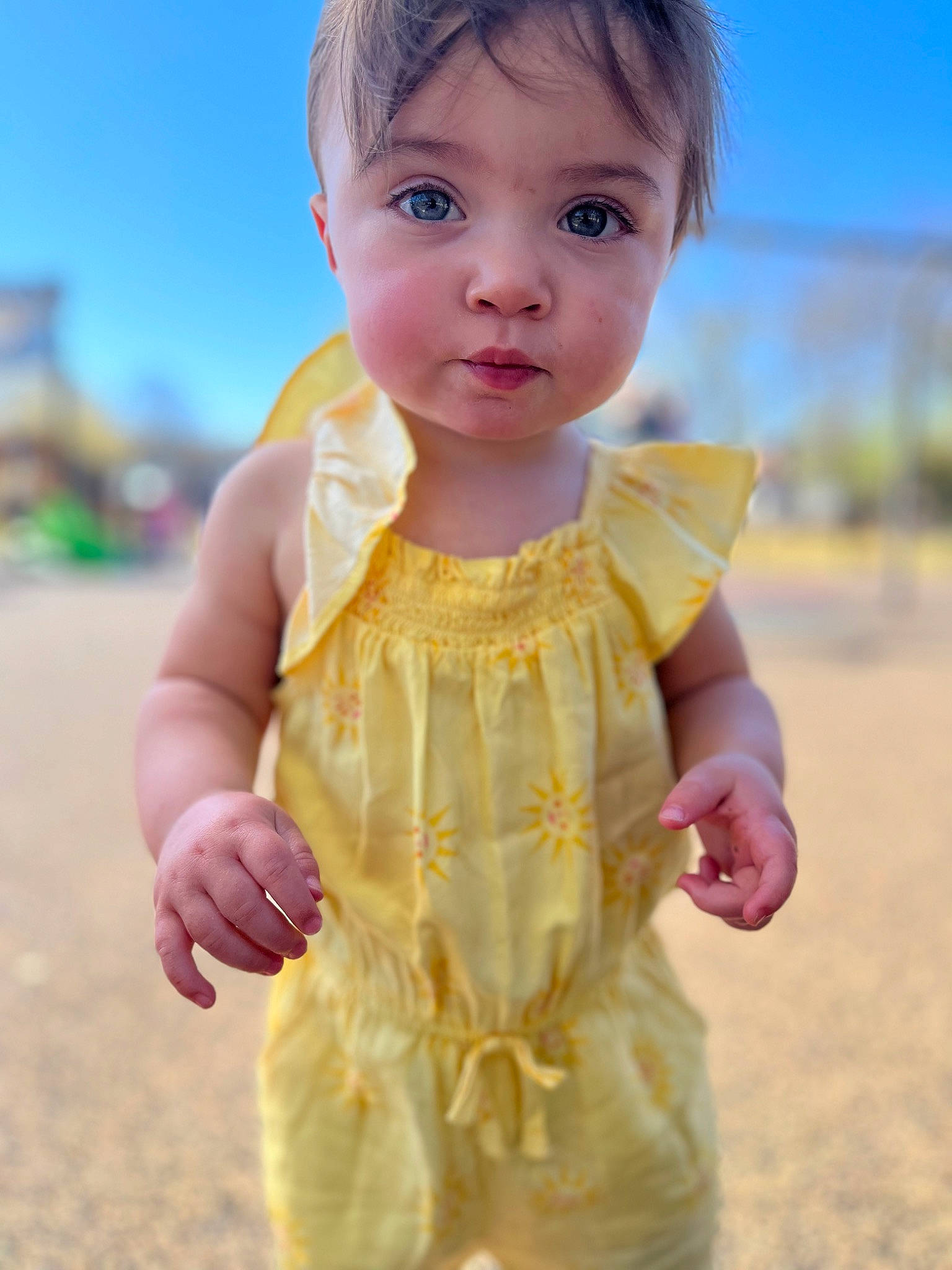 Kingsley is registered to the contest to win money with this photo: baby, baby_toddler_clothing, beach, beauty, child, finger, fun, gesture, grass, happy, head, human, people_in_nature, person, skin, sky, sleeve, snapshot, standing, thumb