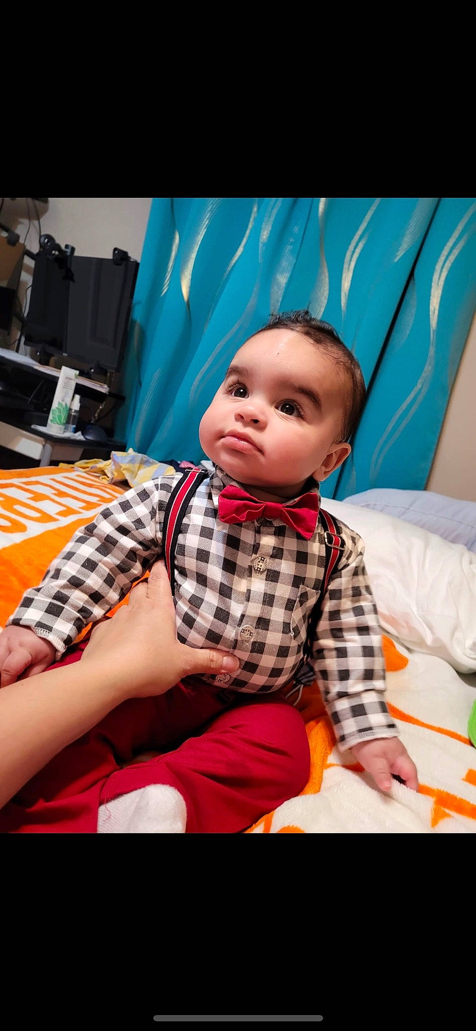 Isaiah joined the competition — help win amazing prizes! baby, child, comfort, couch, event, face, flash_photography, flooring, fun, happy, head, orange, pattern, person, plaid, room, sitting, sleeve, tartan, tie