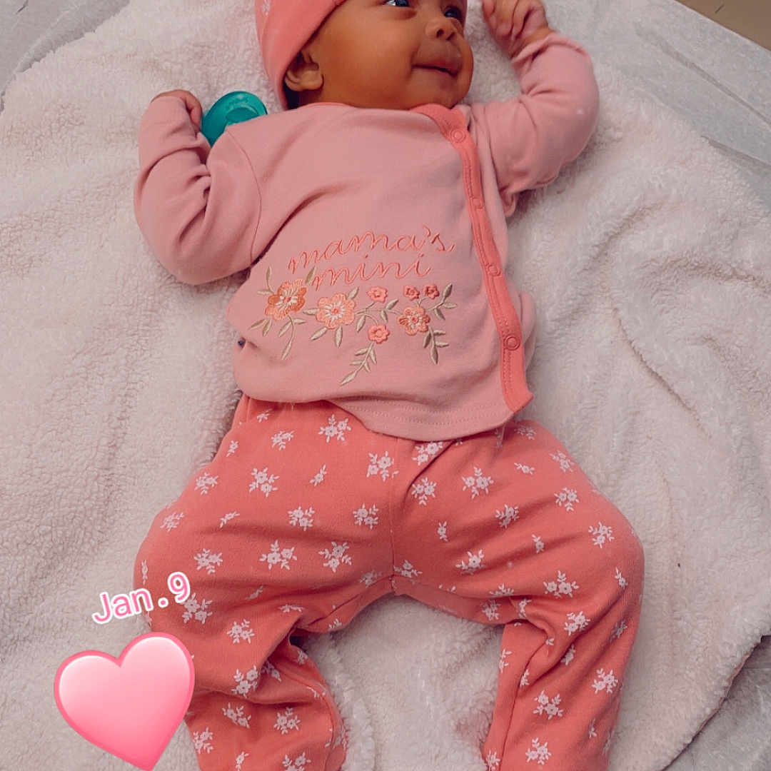 Harmony joined the competition — help win amazing prizes! applique, baby, bed, blanket, bodypart, bonnet, clothing, crib, face, finger, furniture, glove, hand, hat, head, newborn, pattern, person, photography, portrait