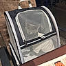 animal_transport, black, cat, chair, dog, empty_carrier, gray, handle, indoor, menu, mesh, pet_carrier, photography, portable, restaurant, seating, table, travel, white, zipper