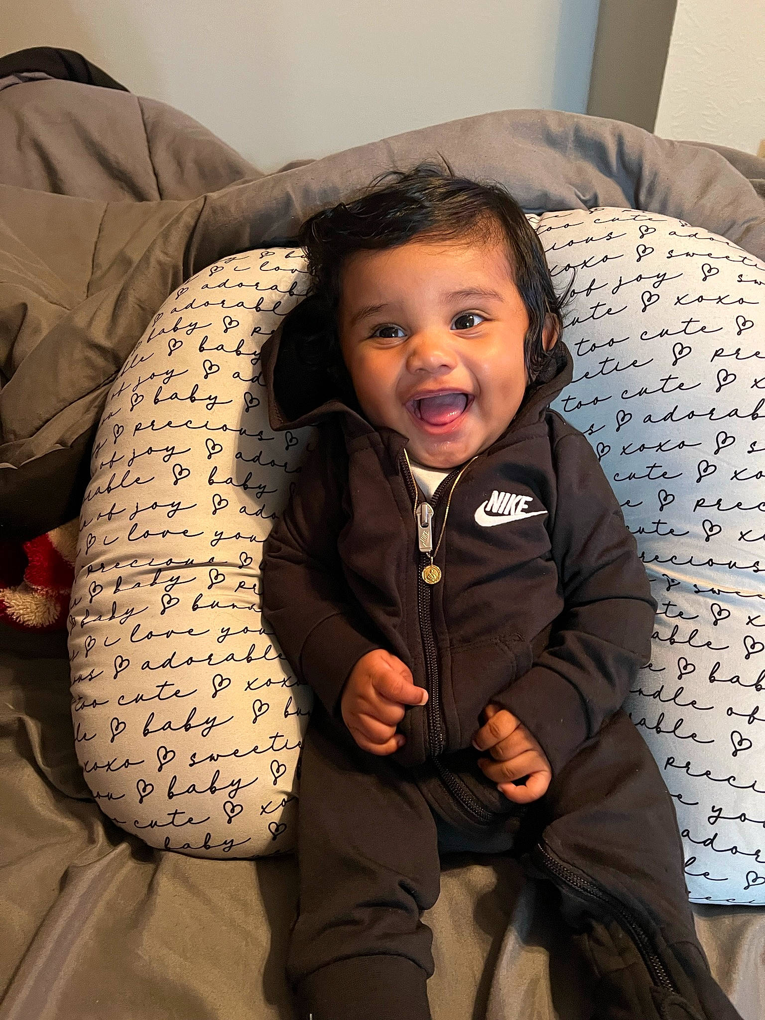 Jacieon joined the competition — help win amazing prizes! baby, baby_toddler_clothing, cheek, child, comfort, couch, eye, facial_expression, flash_photography, flooring, fun, hairstyle, happy, head, linens, person, sitting, skin, sleeve, smile