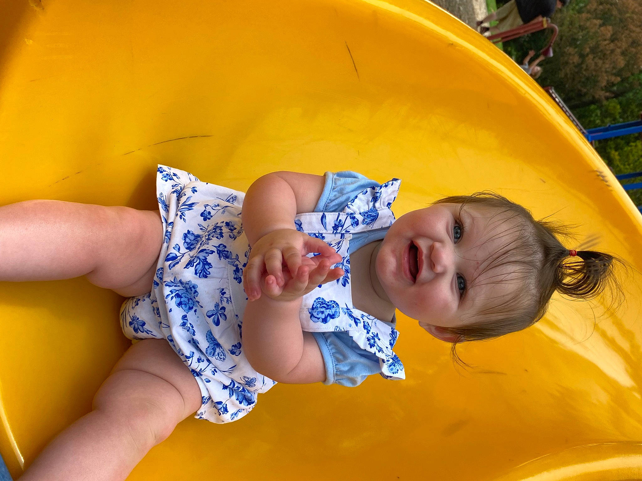 Adalina is registered to the contest to win money with this photo: baby, baby_toddler_clothing, child, comfort, electric_blue, fun, grass, happy, human_leg, inflatable, leisure, pattern, person, play, recreation, sitting, skin, smile, thigh, toddler