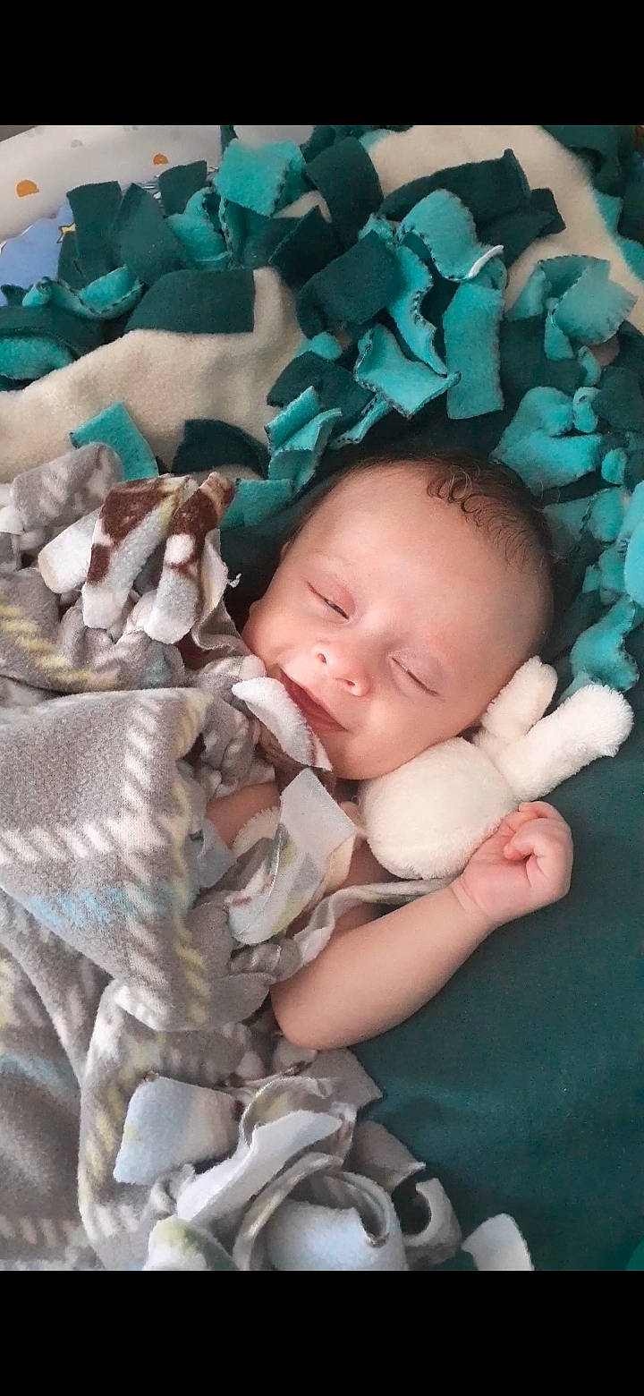 Nathaniel is registered to the contest to win money with this photo: baby, child, person, sleep, toddler