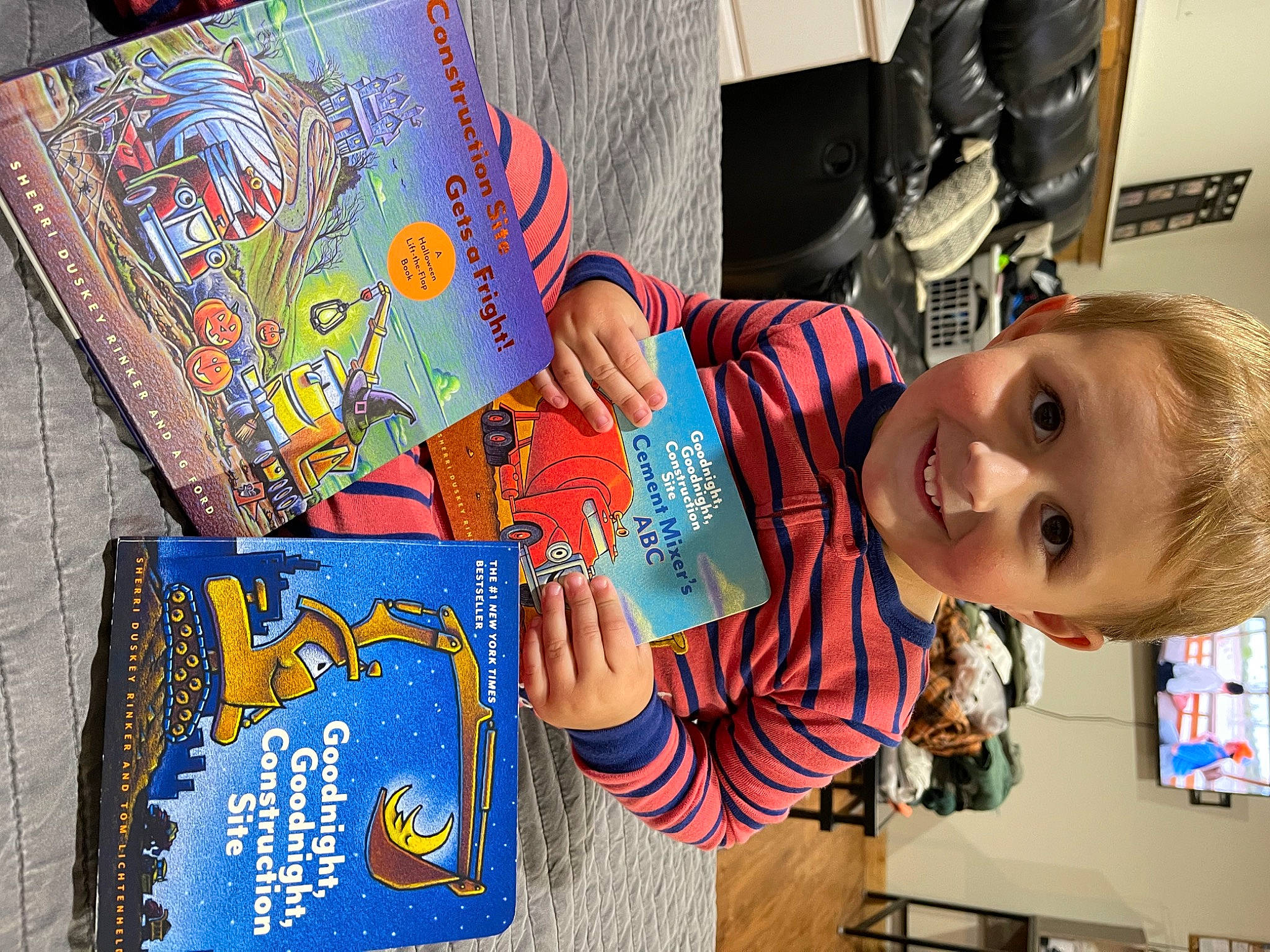 Landyn is registered to the contest to win money with this photo: art, artist, baby, book, child, drawing, fiction, fun, illustration, joy, kindergarten, painting, pattern, person, play, publication, room, smile, t_shirt, toddler