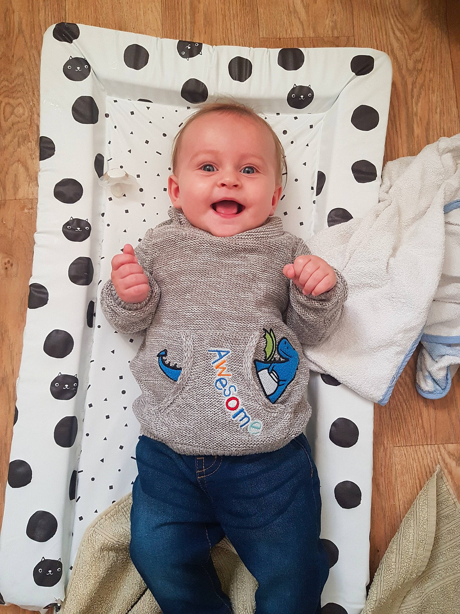 Theo joined the competition — help win amazing prizes! baby_products, blue, boy, child, design, facial_expression, infant, linens, material, outerwear, pattern, person, plaid, play, product, skin, smile, t_shirt, textile, toddler