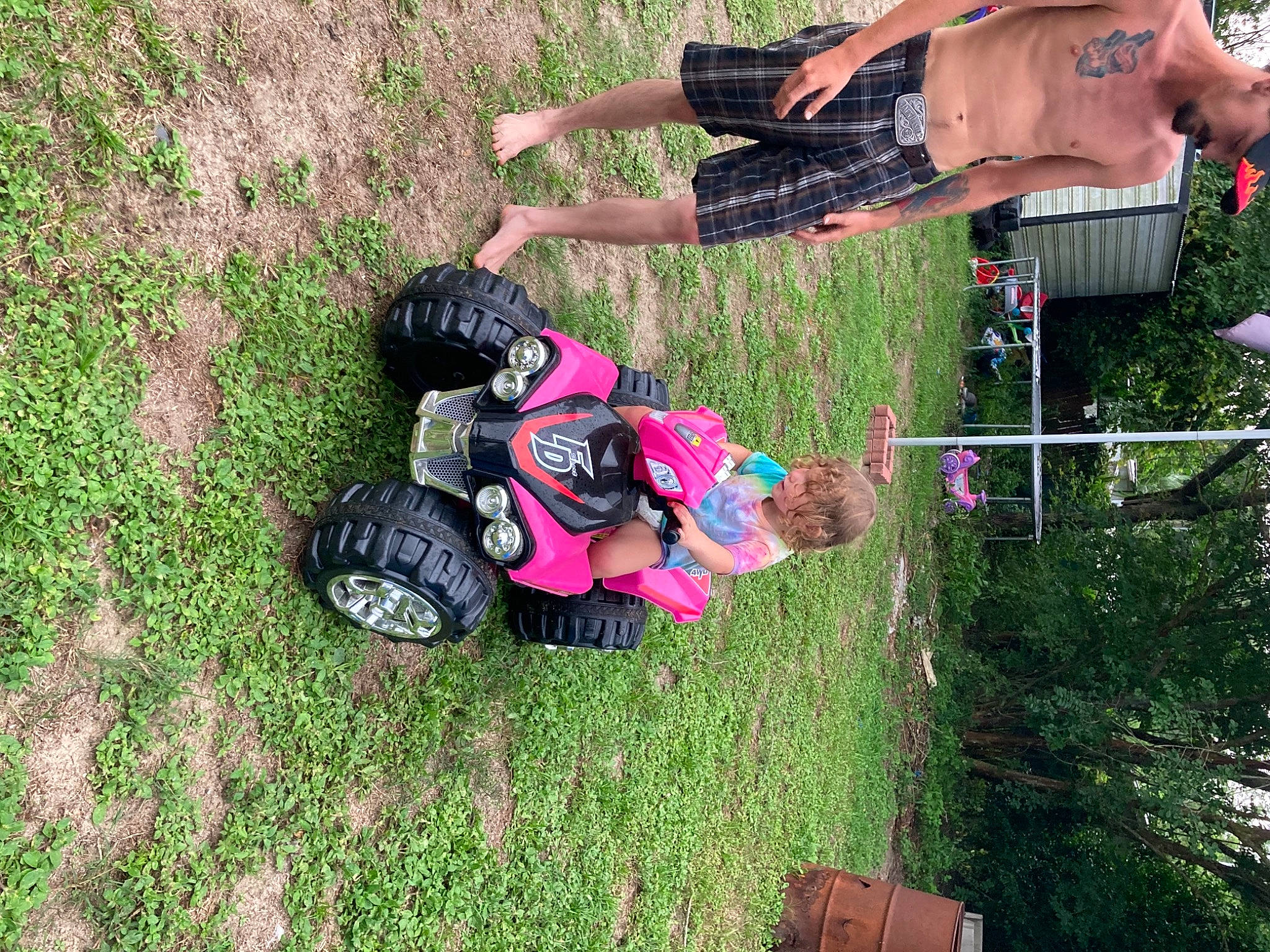 Delilah Evelyn Damron joined the competition — help win amazing prizes! adventure, boot, fun, grass, groundcover, hat, headwear, lawn, leg, leisure, people_in_nature, person, plant, recreation, shoe, shorts, sneakers, soil, tire, toddler