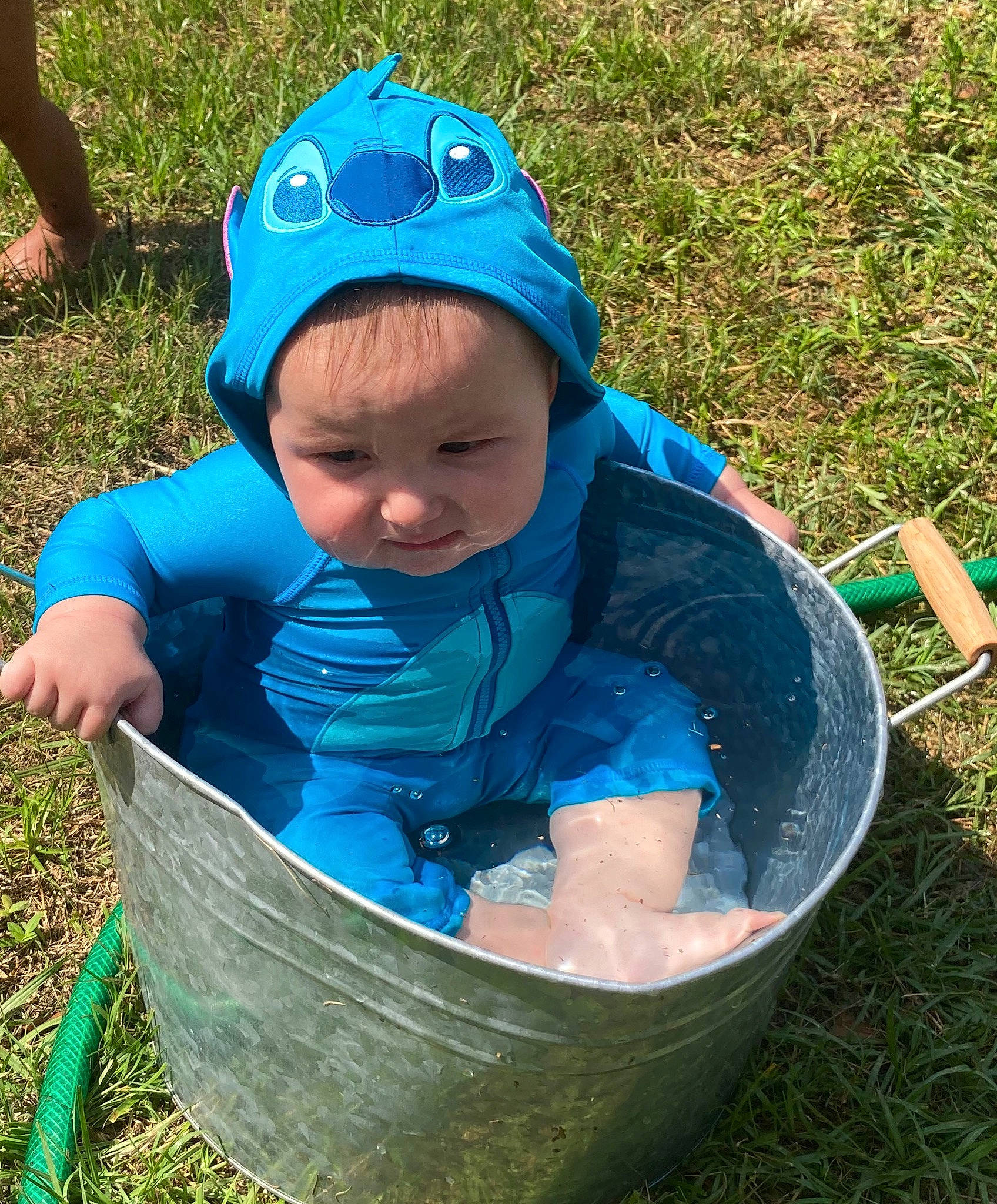 Ciel is registered to the contest to win money with this photo: baby, baby_toddler_clothing, baseball_cap, blue, cap, child, electric_blue, facial_expression, fashion_accessory, fun, grass, green, hat, head, leisure, people_in_nature, person, personal_protective_equipment, recreation, toddler